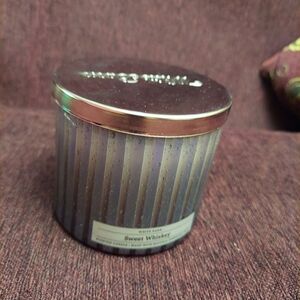 Sweet whiskey candle by bath and body works.